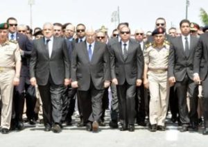 [President Abdel-Fattah Al-Sisi and government officials at the funeral of Prosecutor General Hisham Barakat who was killed in a car bomb attack on 29 June 2015. Source: Official Facebook Page of the Spokesperson of the Egyptian Armed Forces.]