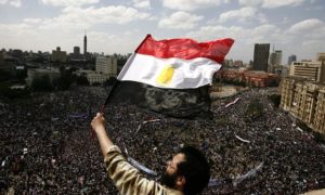 Tens of thousands of Egyptians demonstrate in Cairo’s Tahrir Square in January 2011. Photograph: Misam Saleh/AFP/Getty Images