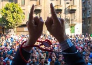 [Egyptian medical doctors gather in front of the Medical Doctors Syndicate building in February 2016 to protest police abuse against medical professionals. Photo from elsfha.com]