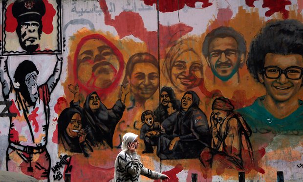 Murals of people killed during Egypt’s uprising. Photograph: Amr Dalsh/Reuters