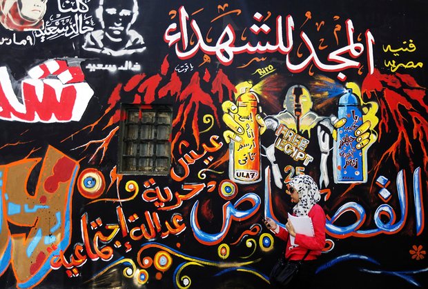 The graffiti on the walls of Mohamed Mahmoud street are a visual reminder of the fighting between protesters and security forces. Photograph: Amr Dalsh/Reuters