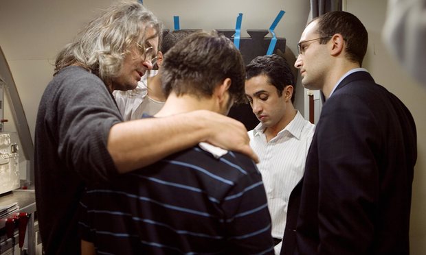 Paul Greengrass ( left) and Khalid Abdalla (right) on set of the film United 93. Photograph: Moviestore Collection/Rex